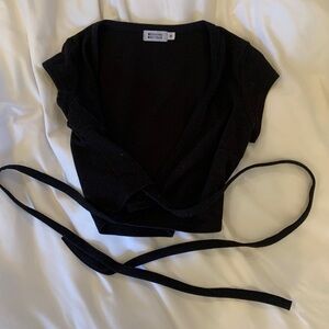 Beginning Boutique black tie crop top that folds over